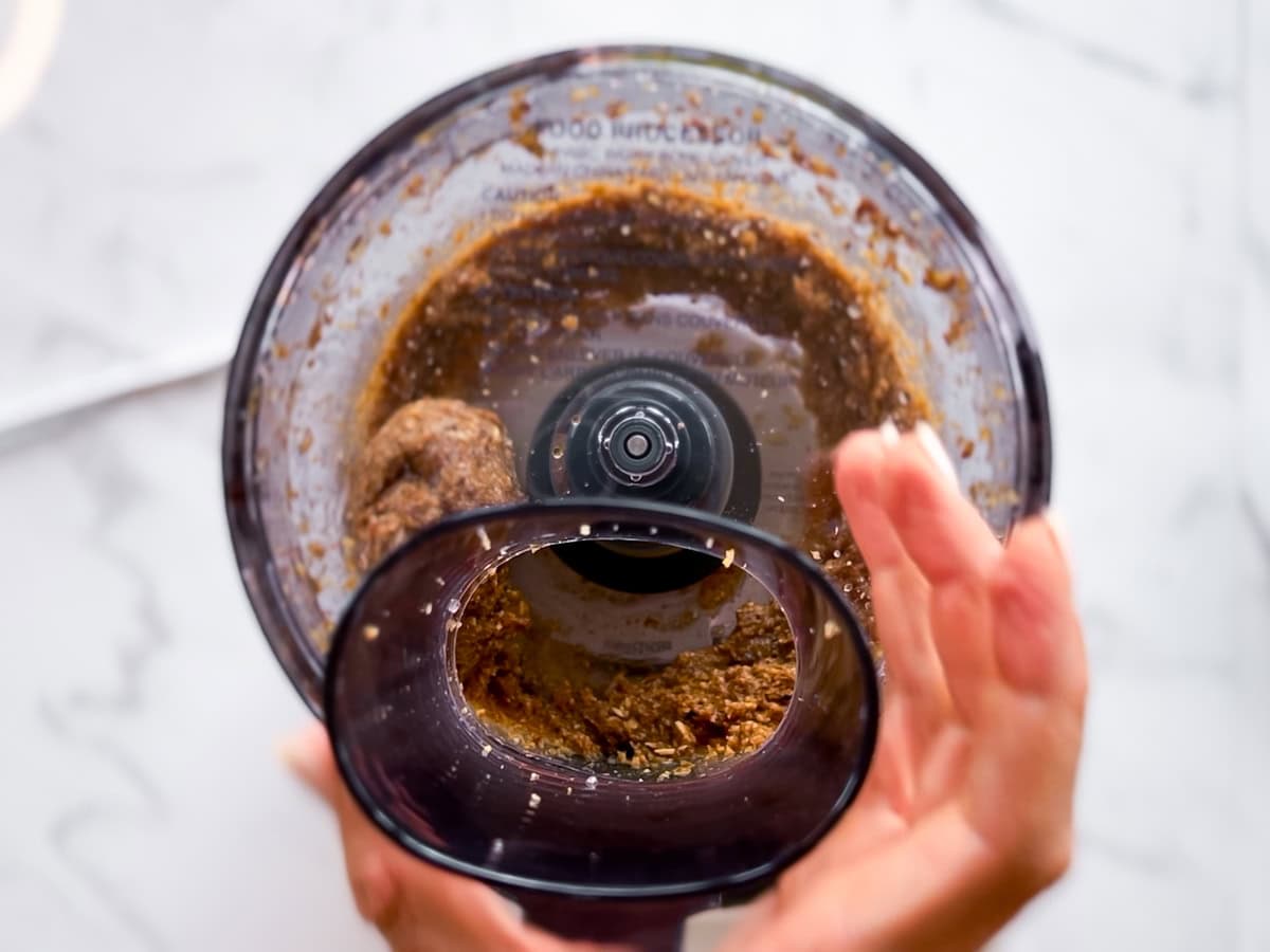 Baked oats dough being processed in the food processor.