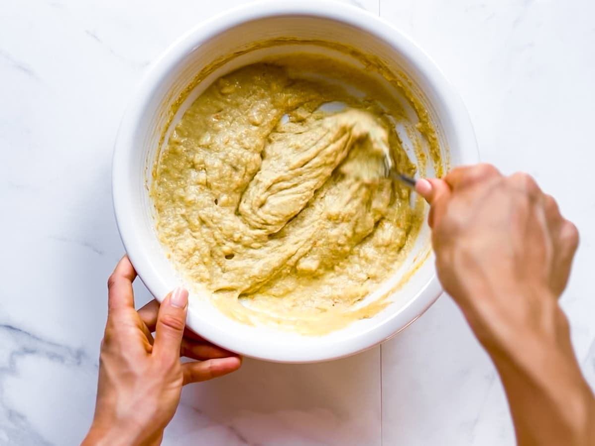 Oat flour waffle batter being mixed.