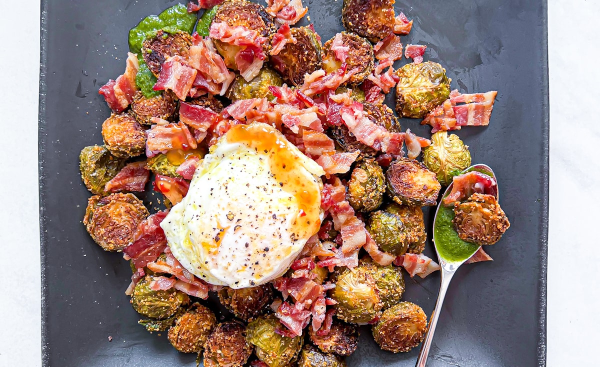 Brussel sprout breakfast with bacon and eggs.