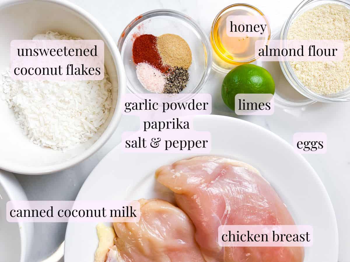 Coconut Crusted chicken ingredients in bowls and labeled.