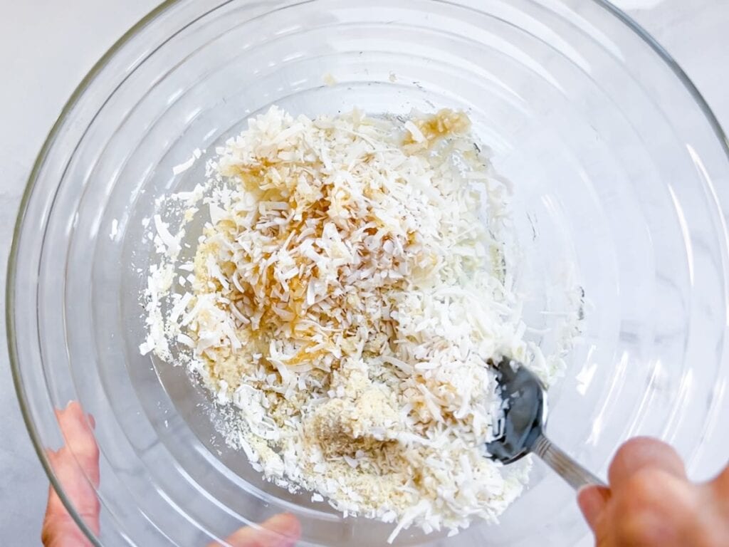 Stirring the Coconut balls ingredients.