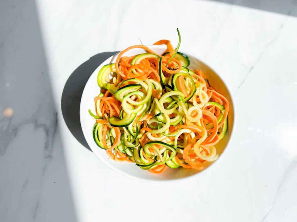 Spiraled sweet potato and zucchini noodles.