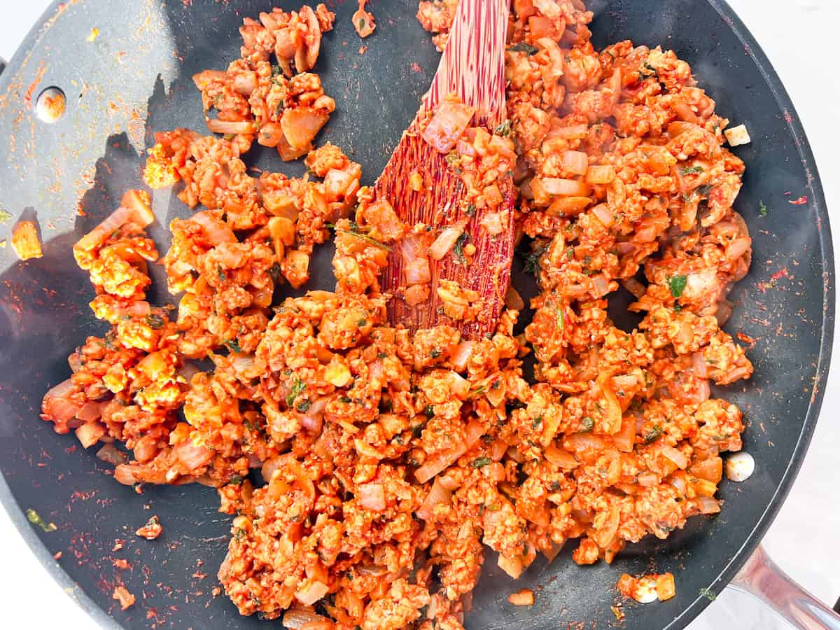 Lebanese cabbage roll filling with sauce.