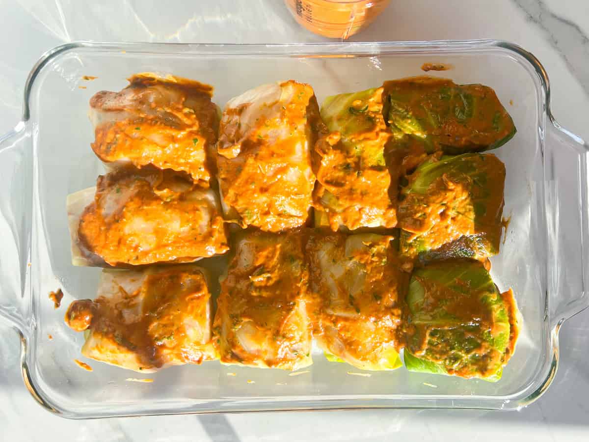 Malfouf covered in the sauce and ready to bake.