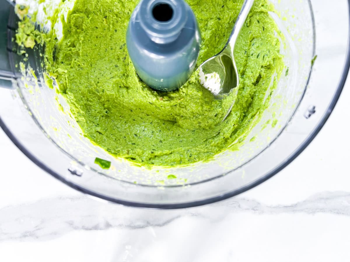 Blended pesto in the food processor.