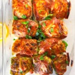 Finished malfouf cabbage rolls in a clear dish.