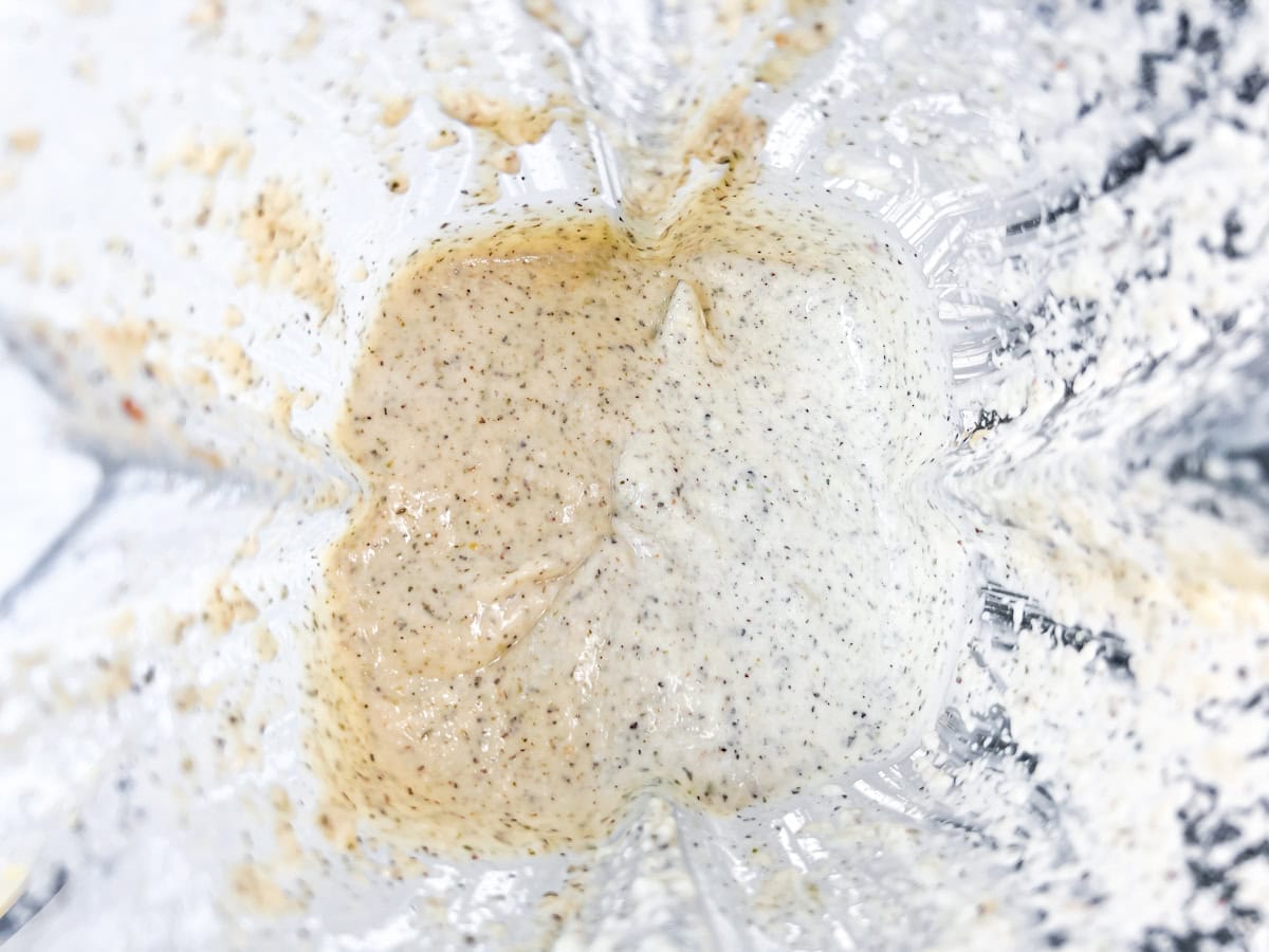 Fully blended garlic parmesan sauce.