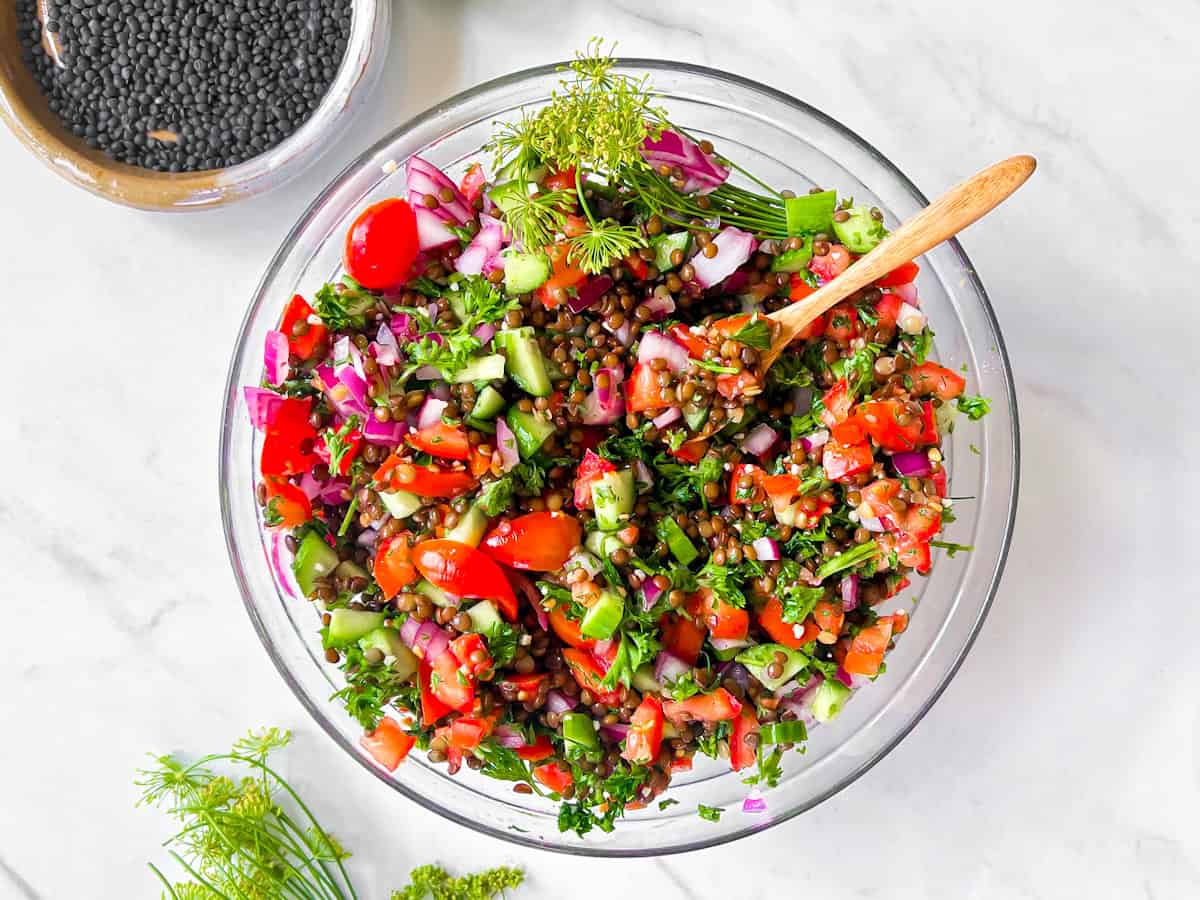Lentil Tabbouleh in a clear bowl.