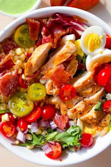 Chick-Fil-A Cobb Salad with grilled chicken and fresh veggies in a bowl.