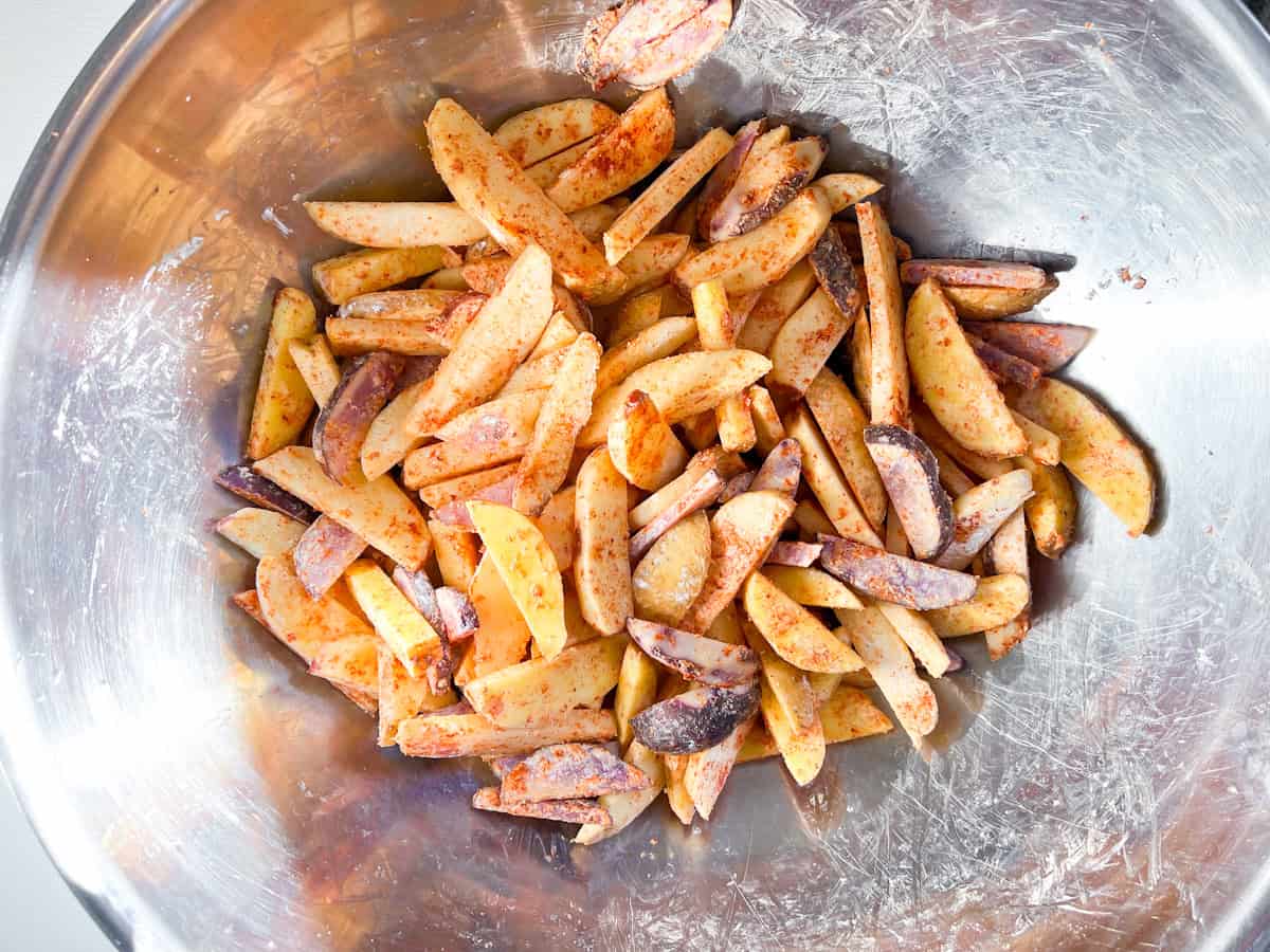 Potatoes tossed in all of the seasonings. 
