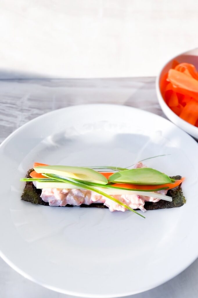 Lobster sushi being made.