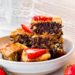 Finished baked oats without banana topped with sliced strawberries.