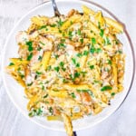Finished garlic parmesan chicken pasta in a large bowl.