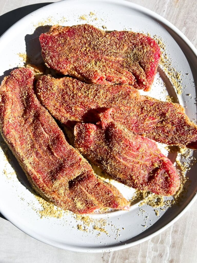 Seasoned steak.