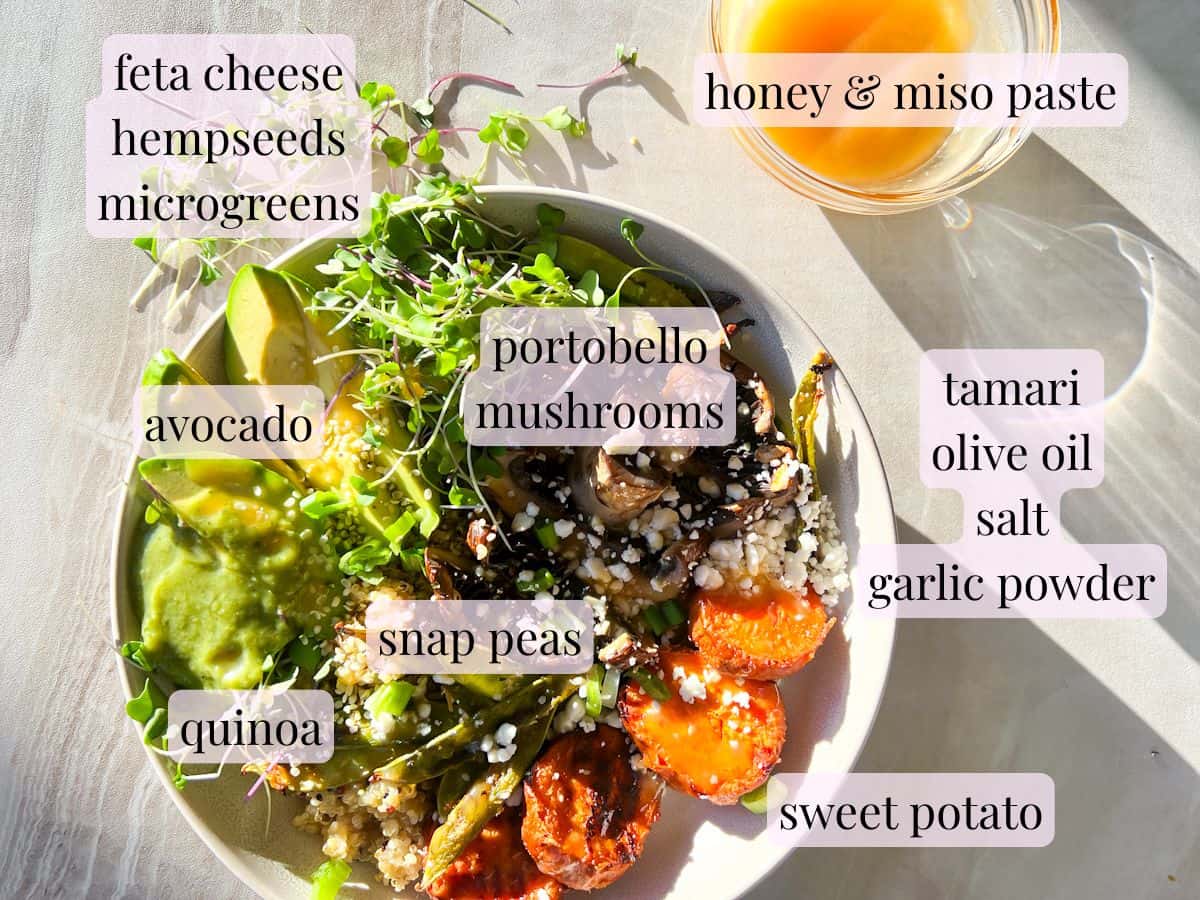 Assembled ancient grain bowl with ingredients labeled.
