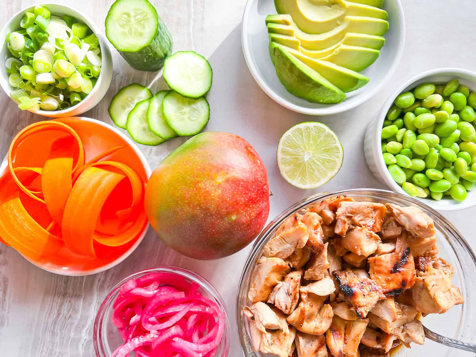 Teriyaki chicken poke bowl ingredients.