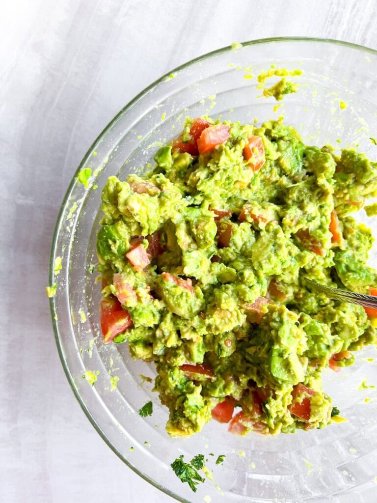 Mixed guac ingredients.