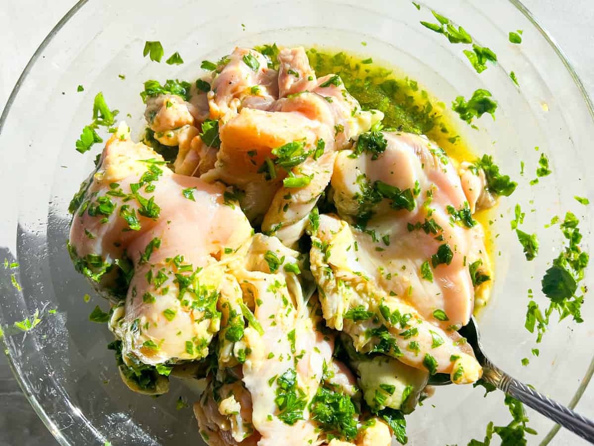Marinating chicken thighs.