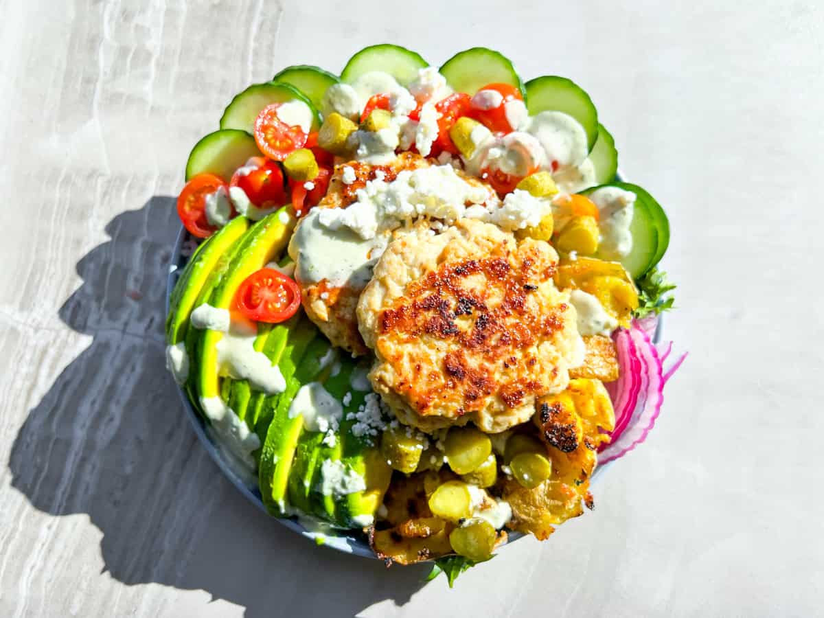 Fully assembled healthy burger bowls.