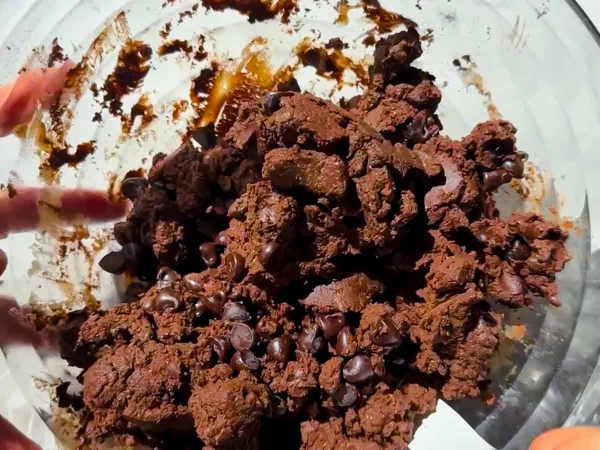 Edible brownie batter dough mixed.