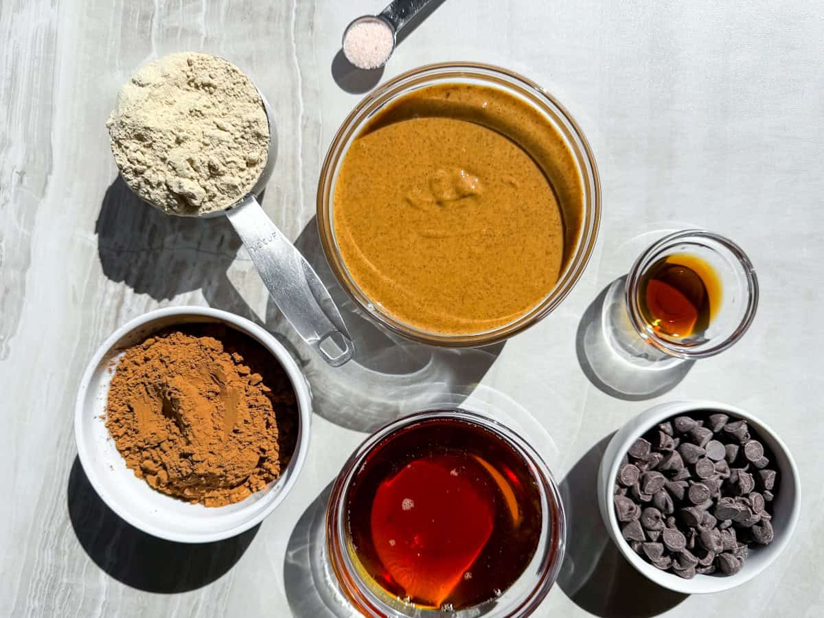 Edible brownie batter ingredients measured out in bowls.