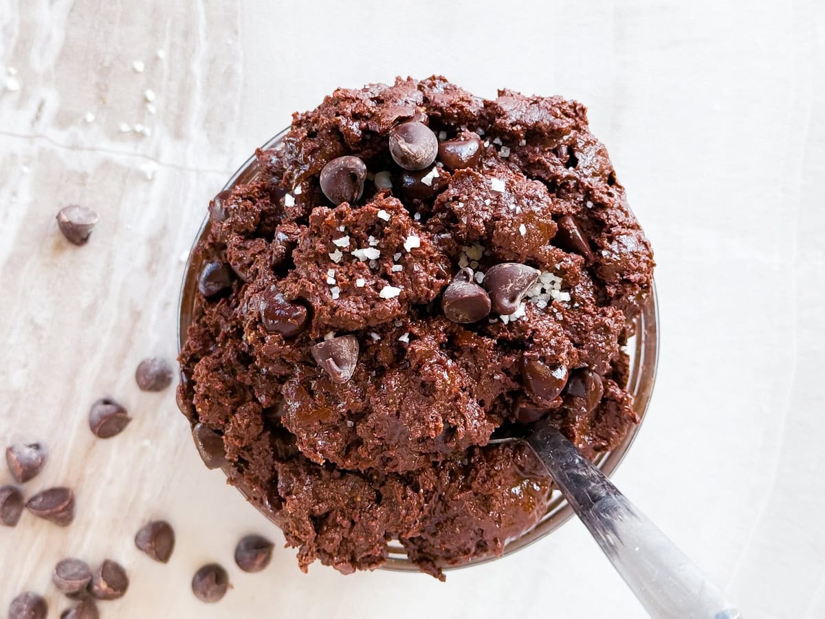 Finished edible brownie batter in a small bowl.