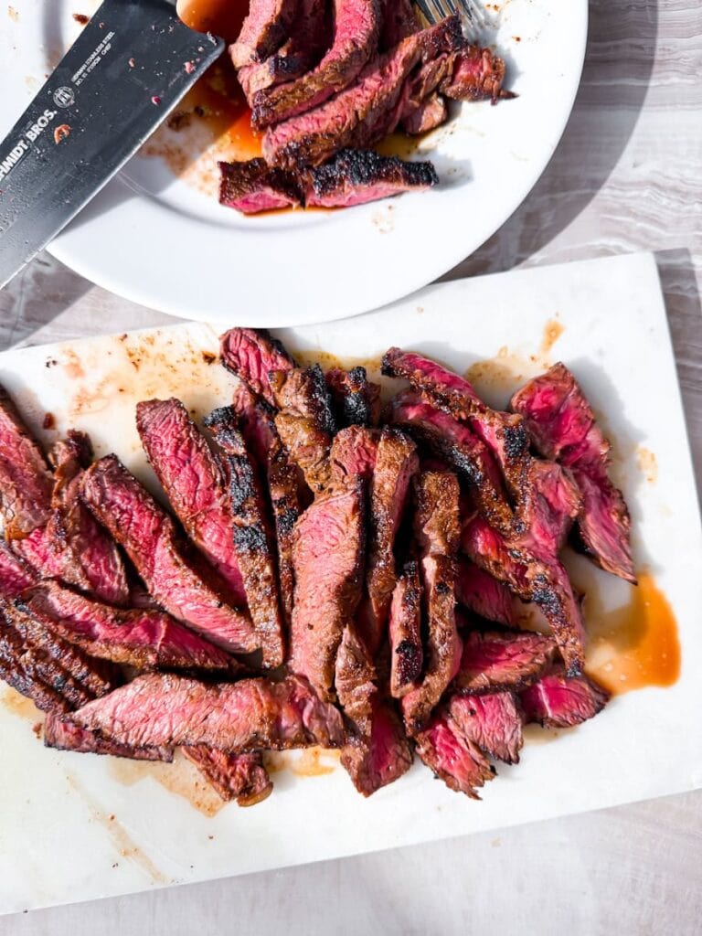 Cut up steak.