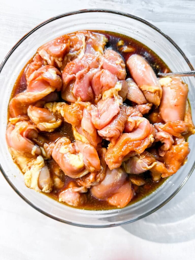 Marinating chicken thighs.