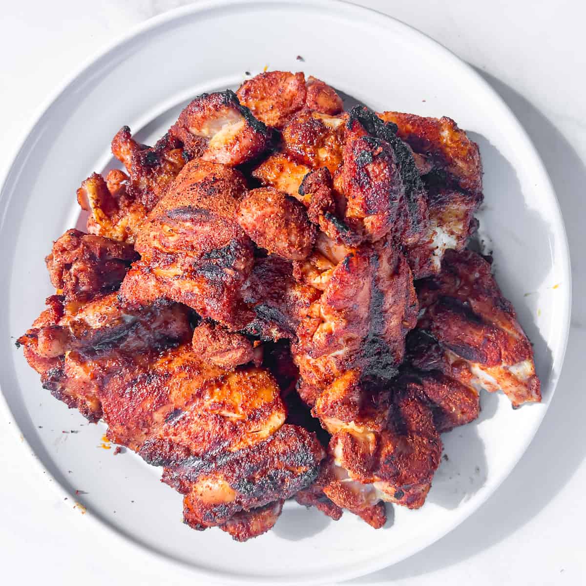 Homemade chicken taco seasoning on chicken thighs.