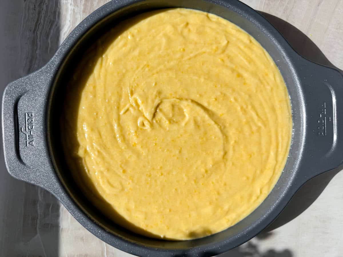 cake batter in a pan ready to be baked.