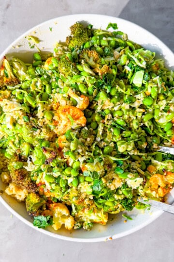 quinoa edamame salad finished in a white bowl.