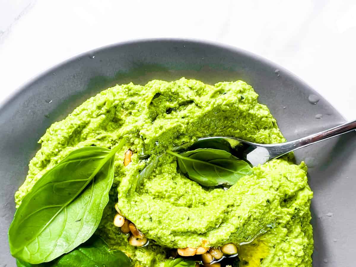 Finished wild ramp pesto on a gray plate.